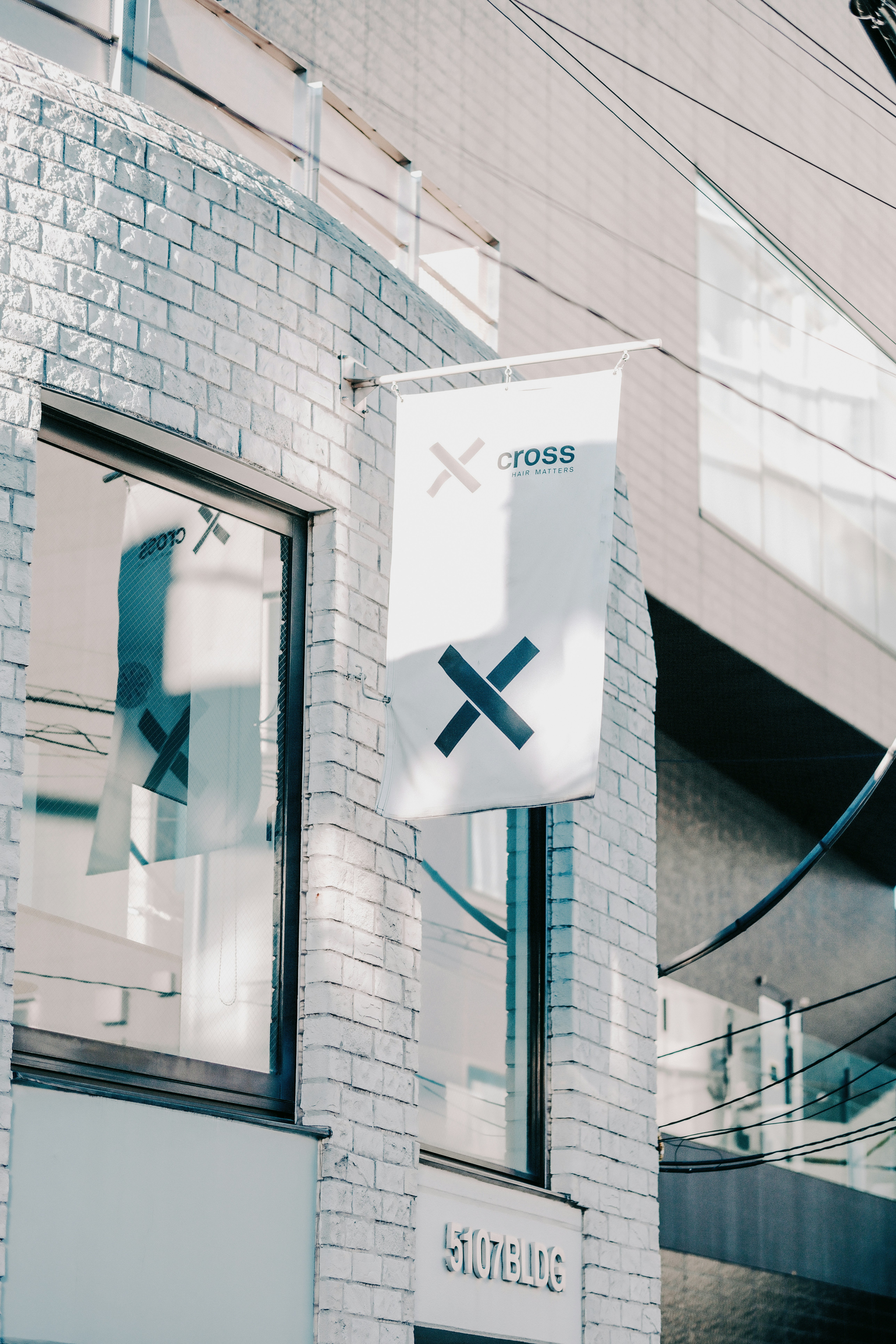 Centennial Plaza — large-scale architectural signage on a commercial building facade